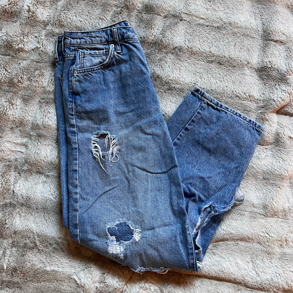 Ripped high, waisted jeans